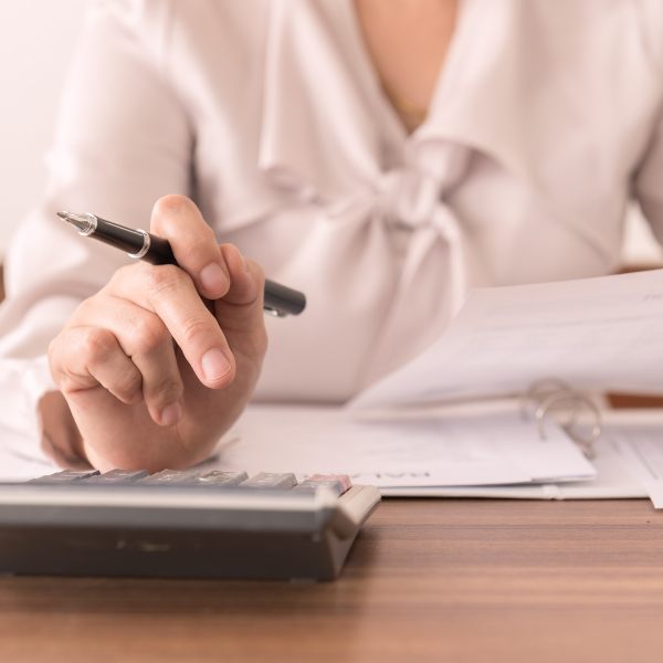 female with accounting book and calculator